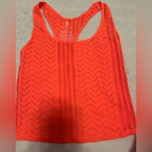 NWOT. Free people movement perforated Racerback tank top / Orange